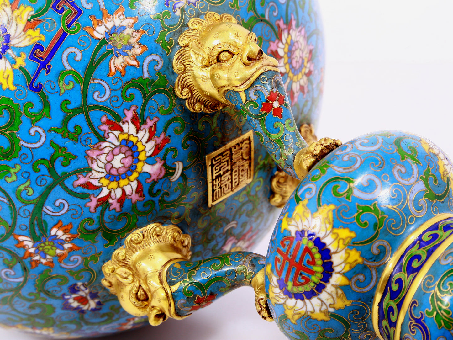 A pair of cloisonne lotus pattern bat ear incense burners