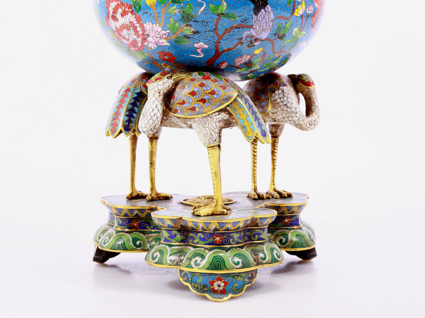 A cloisonné flower and bird pattern two-eared three-legged incense burner with lid