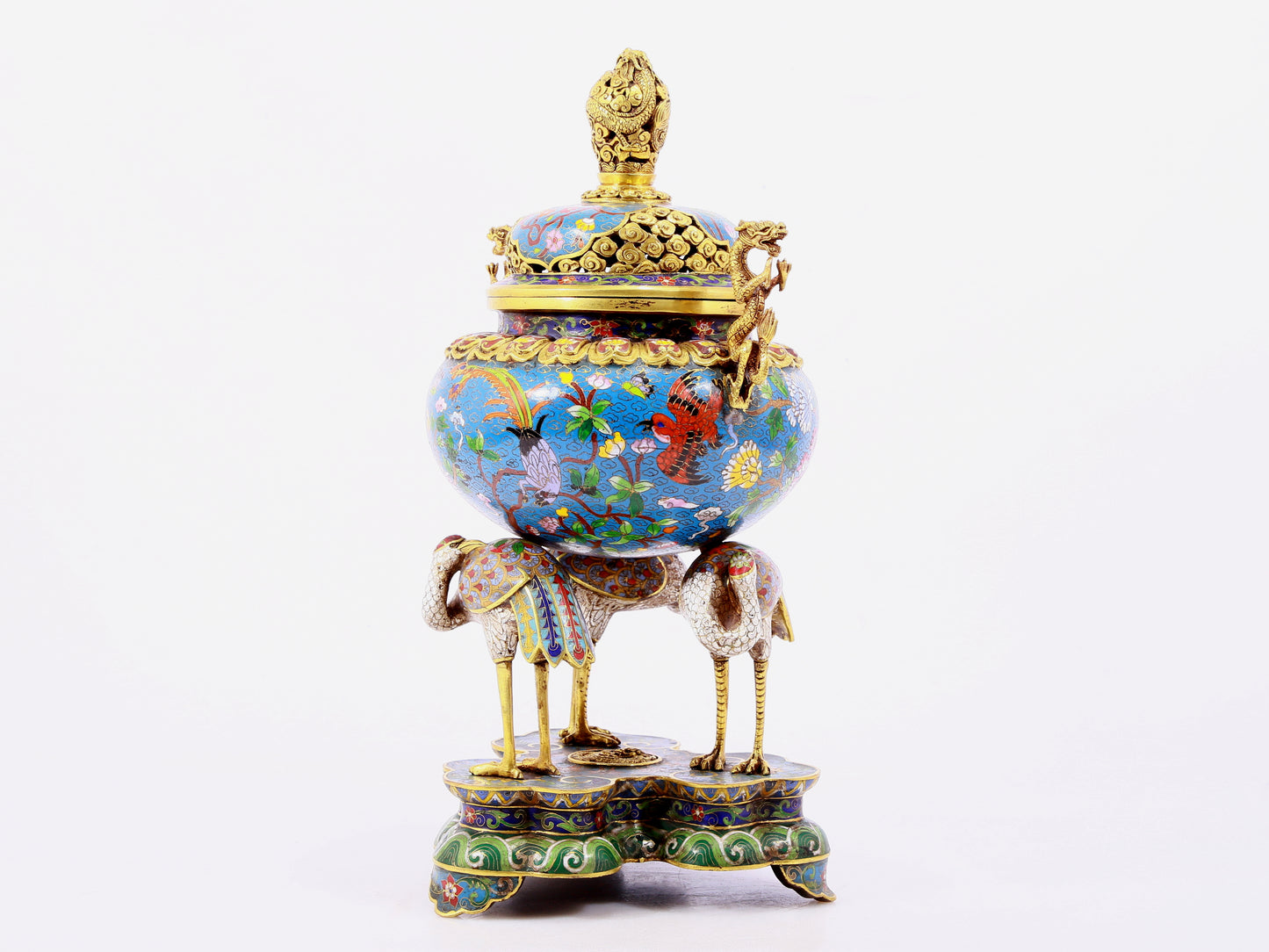 A cloisonné flower and bird pattern two-eared three-legged incense burner with lid