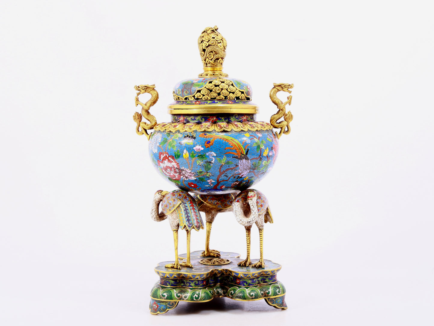 A cloisonné flower and bird pattern two-eared three-legged incense burner with lid