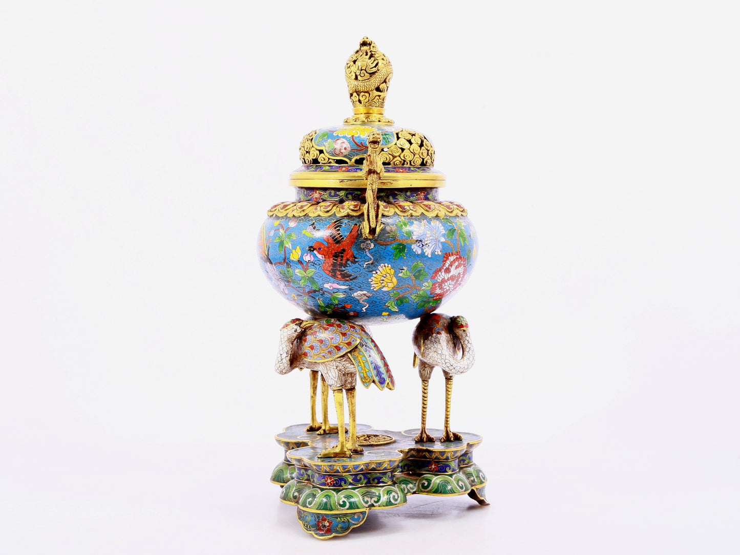 A cloisonné flower and bird pattern two-eared three-legged incense burner with lid