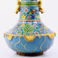 A pair of cloisonné butterfly and flower pattern amphora