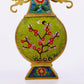 A pair of cloisonné flower and bird pattern amphora