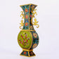 A pair of cloisonné flower and bird pattern amphora