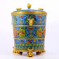 A cloisonné auspicious cloud and auspicious animal pattern three-legged jar with lid