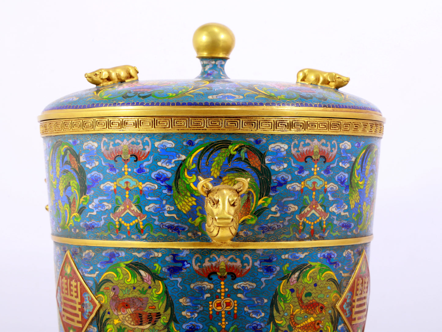 A cloisonné auspicious cloud and auspicious animal pattern three-legged jar with lid