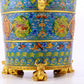 A cloisonné auspicious cloud and auspicious animal pattern three-legged jar with lid