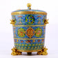 A cloisonné auspicious cloud and auspicious animal pattern three-legged jar with lid