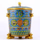 A cloisonné auspicious cloud and auspicious animal pattern three-legged jar with lid