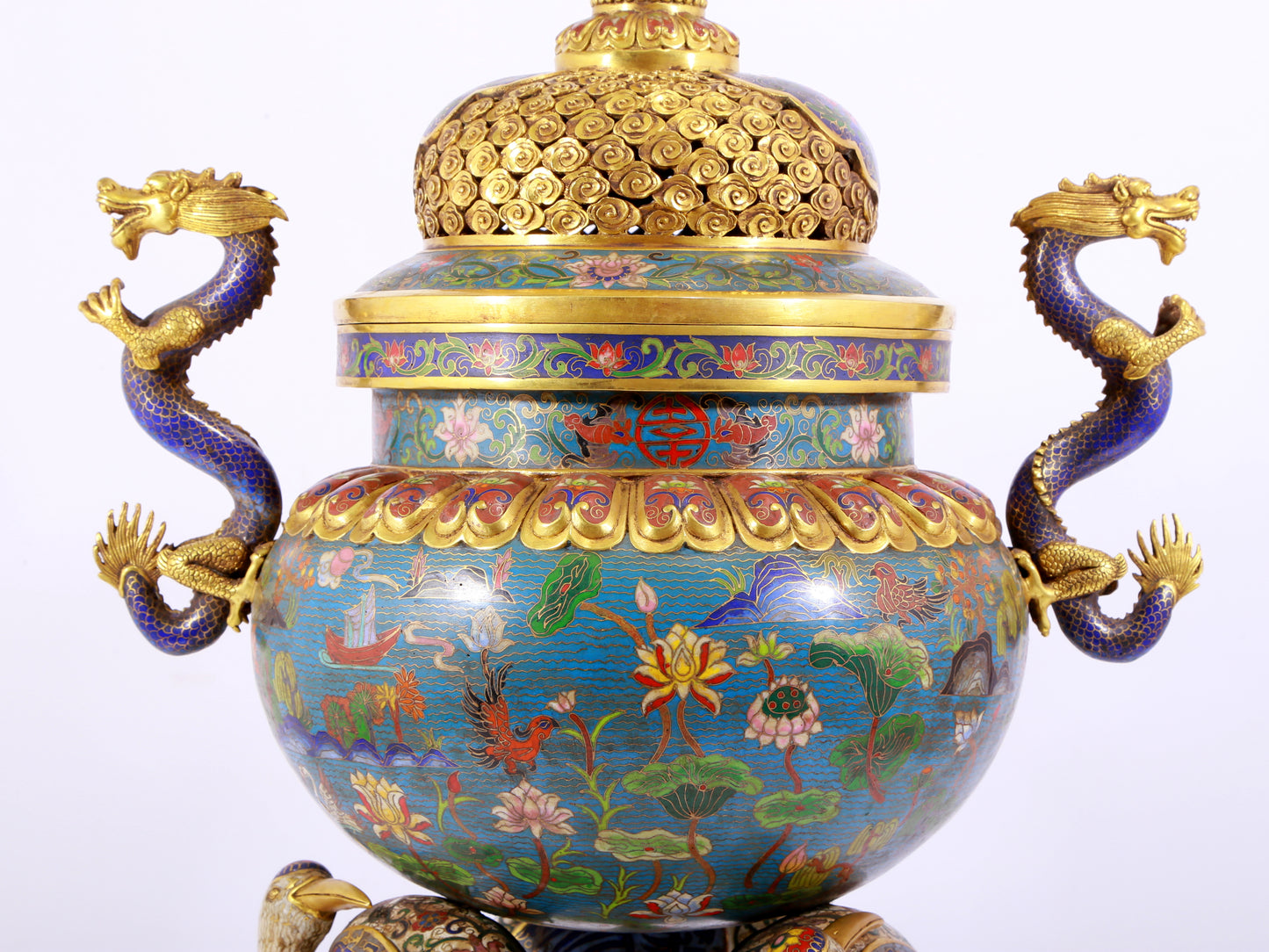 A cloisonné lotus pattern two-eared three-legged incense burner with lid