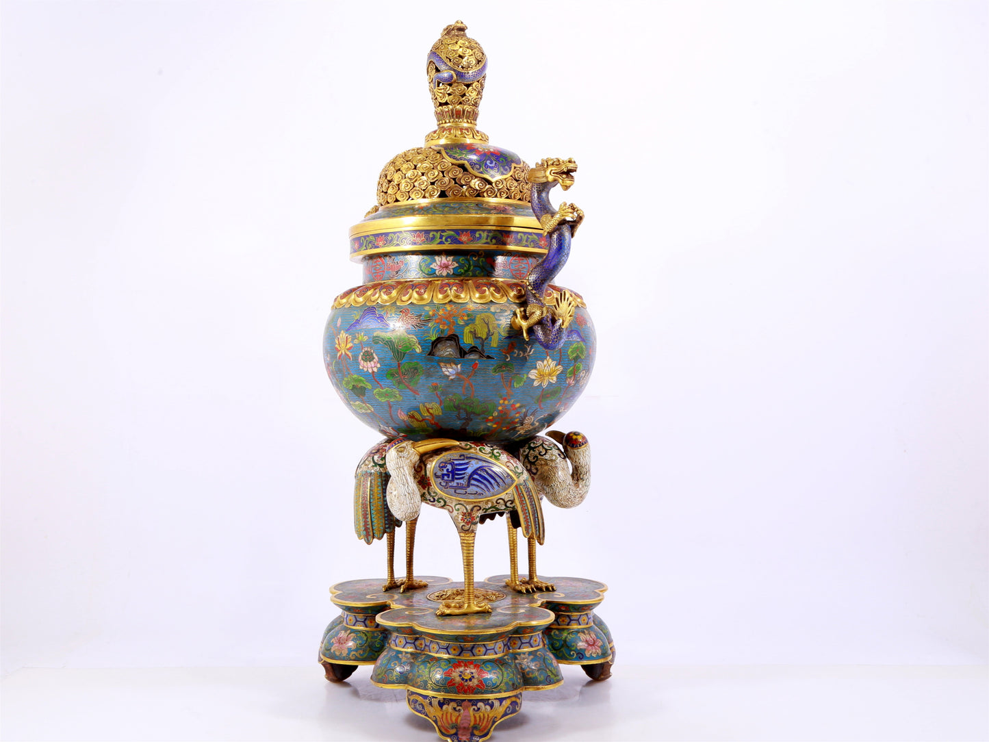 A cloisonné lotus pattern two-eared three-legged incense burner with lid