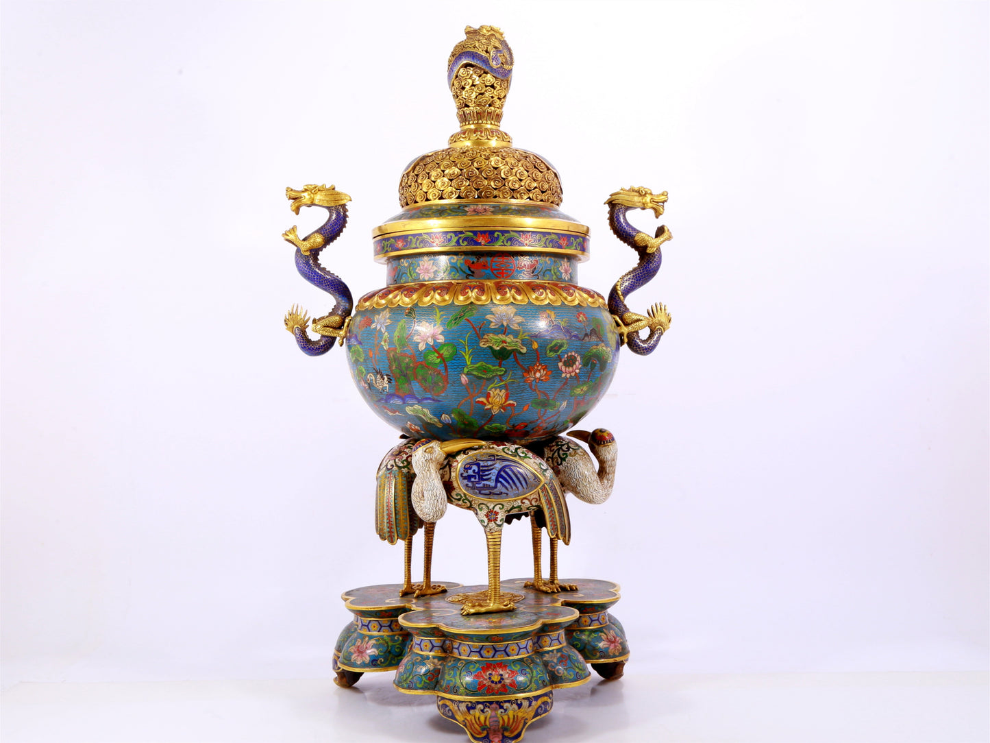 A cloisonné lotus pattern two-eared three-legged incense burner with lid