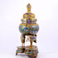 A cloisonné lotus pattern two-eared three-legged incense burner with lid