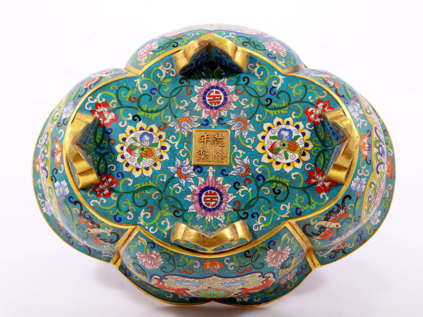 A cloisonné basin with entangled lotus and auspicious animal patterns