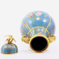 A pair of cloisonne flower and bird pattern amphora