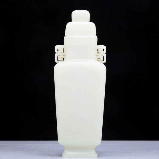 A Precious White Jade Vase And Cover