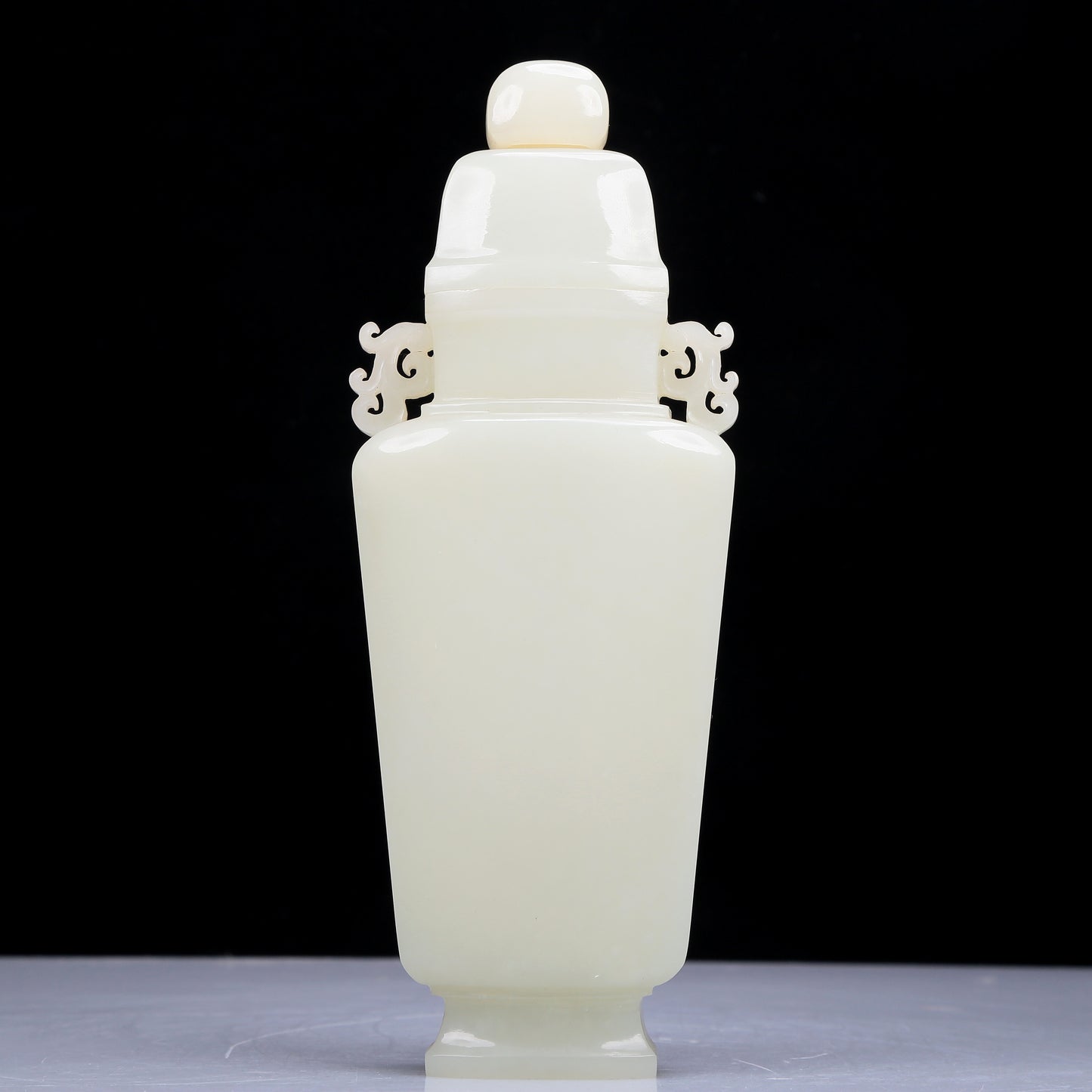 A Precious White Jade Vase And Cover