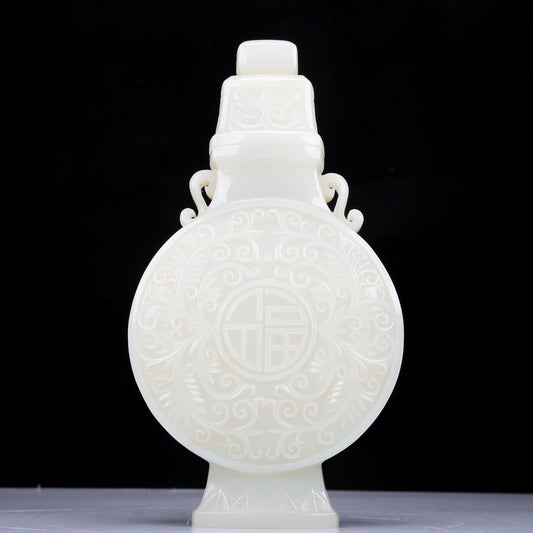 A Precious White Jade 'Scrolling Lotus' Vase And Cover