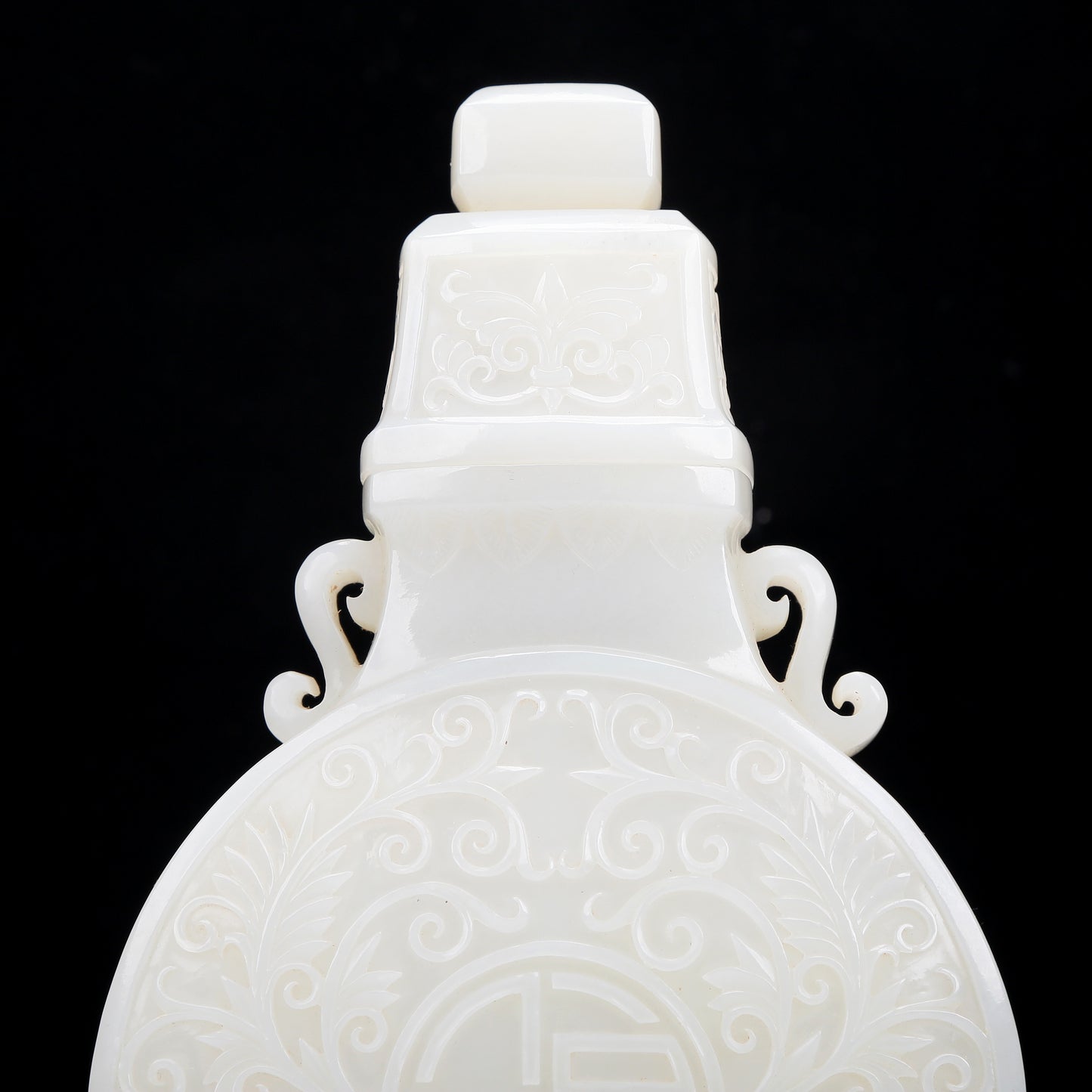 A Precious White Jade 'Scrolling Lotus' Vase And Cover