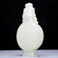 A Precious White Jade 'Scrolling Lotus' Vase And Cover