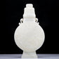 A Precious White Jade 'Scrolling Lotus' Vase And Cover