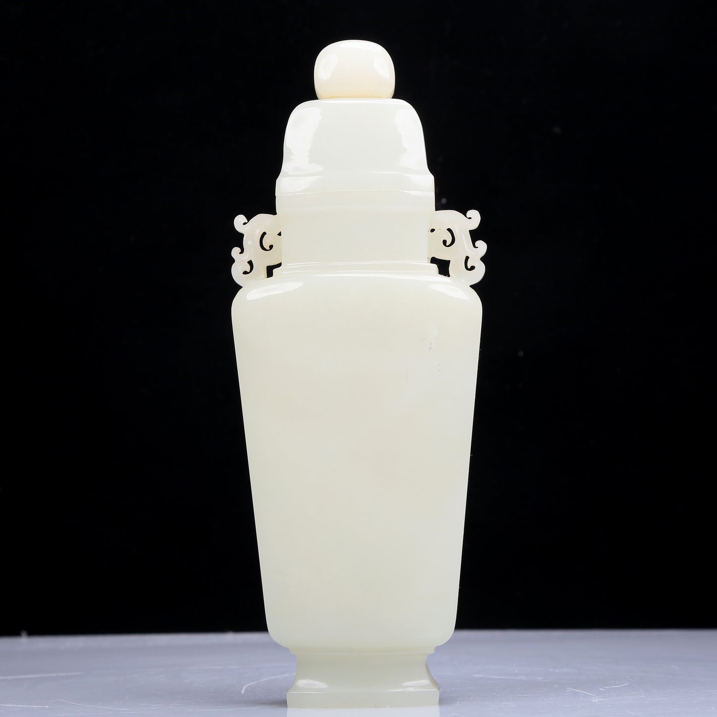 A Precious White Jade Vase And Cover