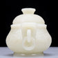 A Precious White Jade 'Scrolling Lotus' Censer And Cover