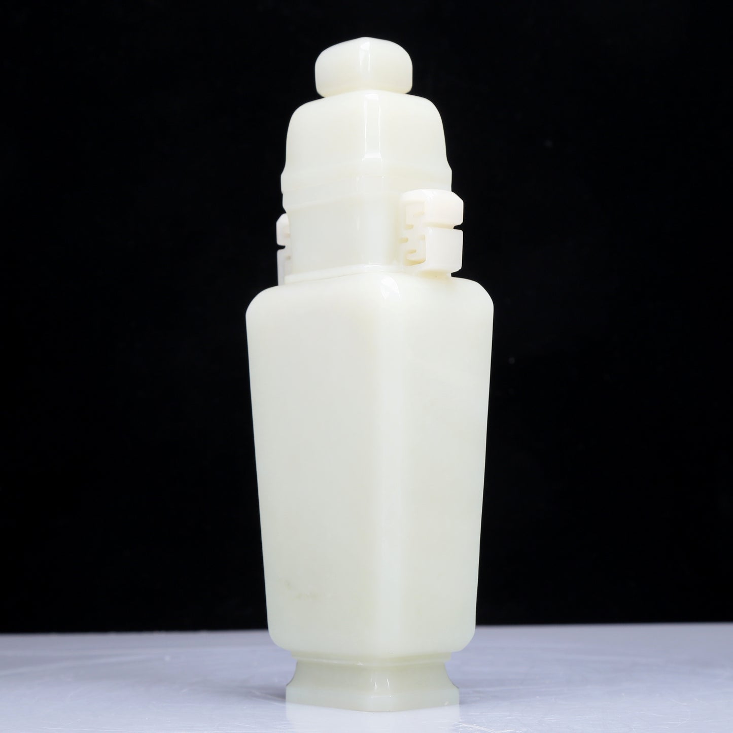 A Precious White Jade Vase And Cover