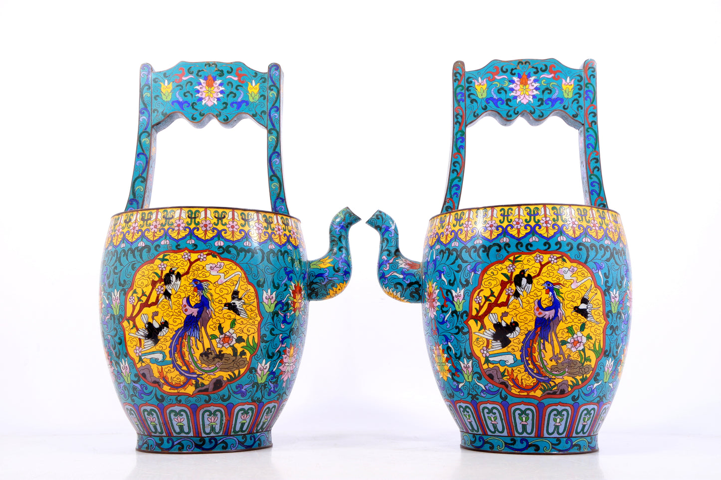 A perfect pair of cloisonné 'Twinkle lotus and Phoenix' patterned ewers