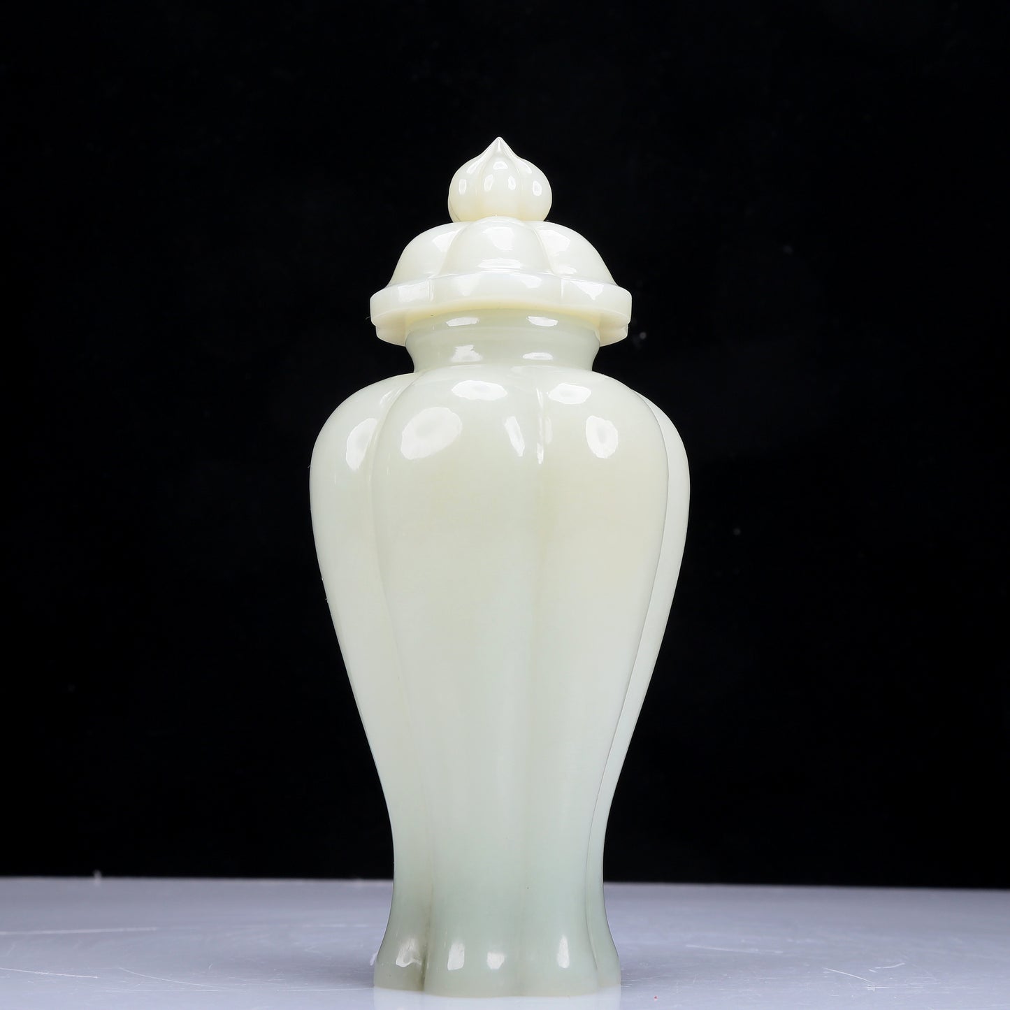 A Precious White Jade Vase And Cover