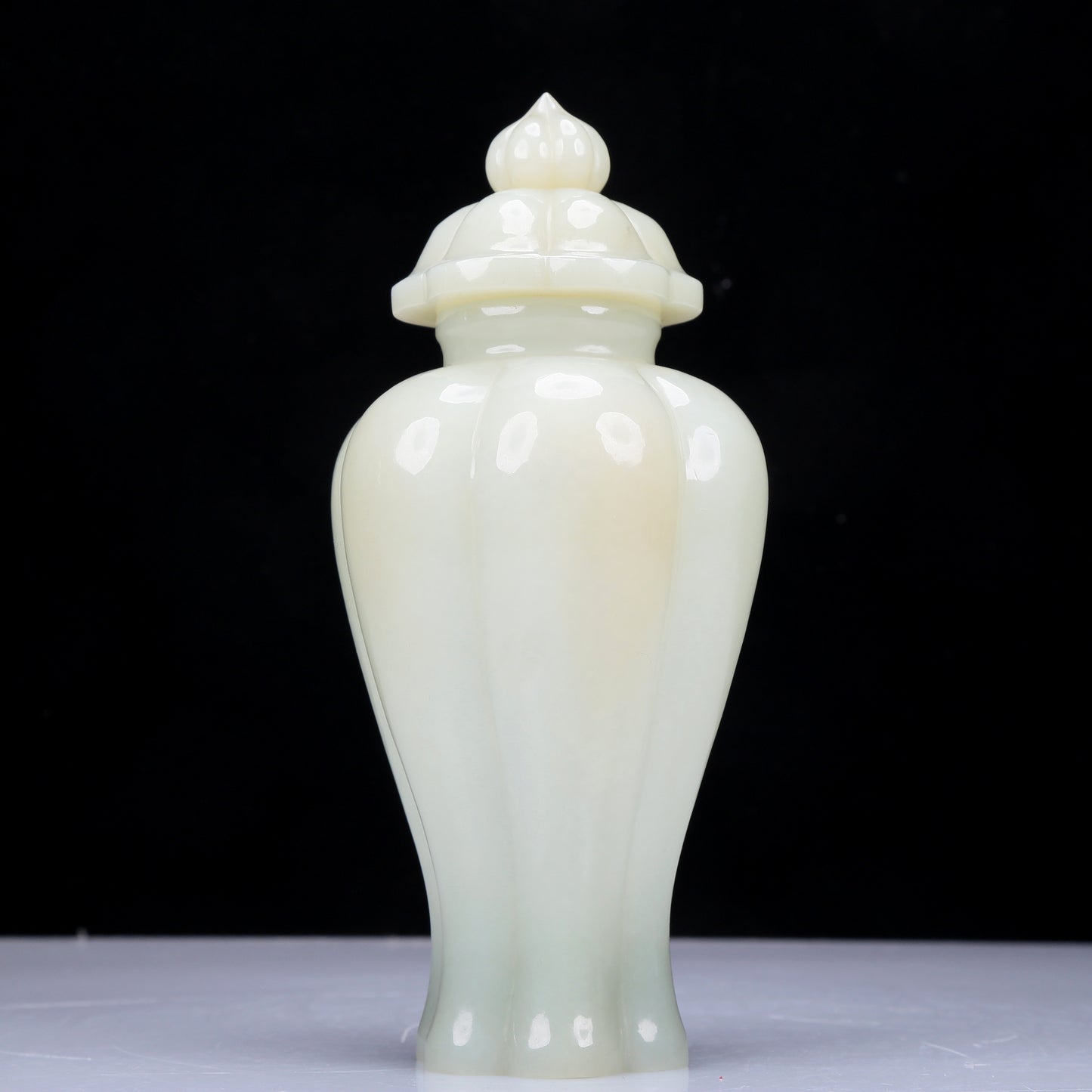 A Precious White Jade Vase And Cover