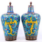 A perfect pair of cloisonne lotus and phoenix pattern jars with lids