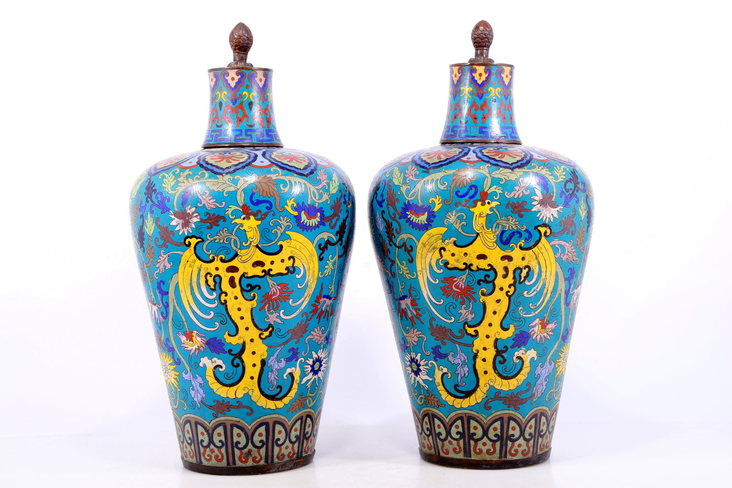 A perfect pair of cloisonne lotus and phoenix pattern jars with lids