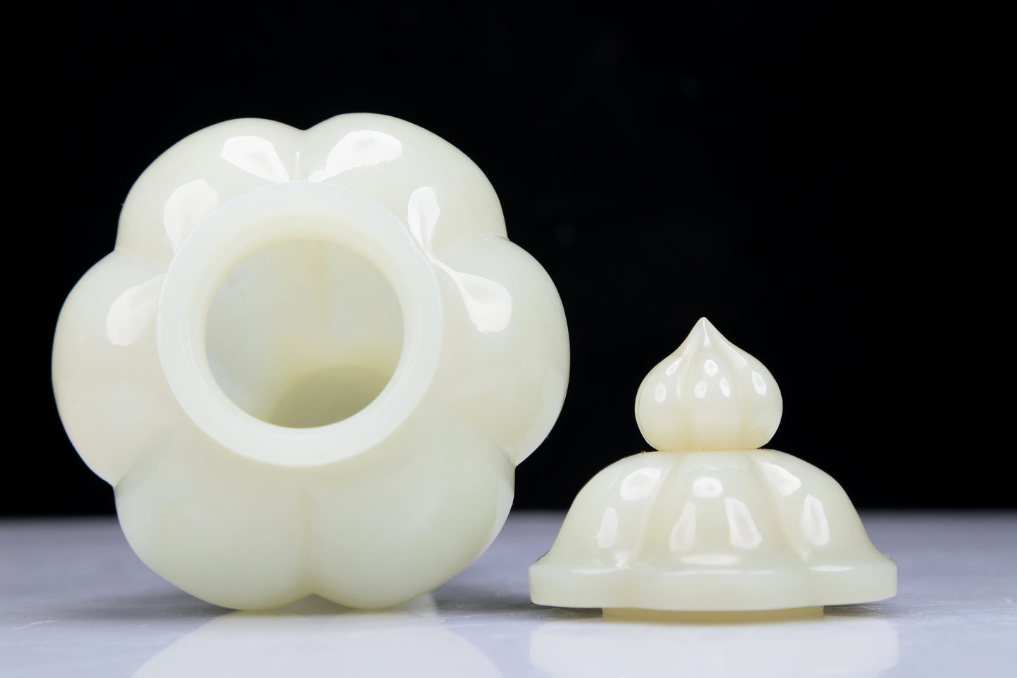 A Precious White Jade Vase And Cover