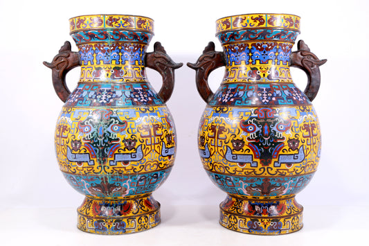 A perfect pair of cloisonné animal face vases with double earse