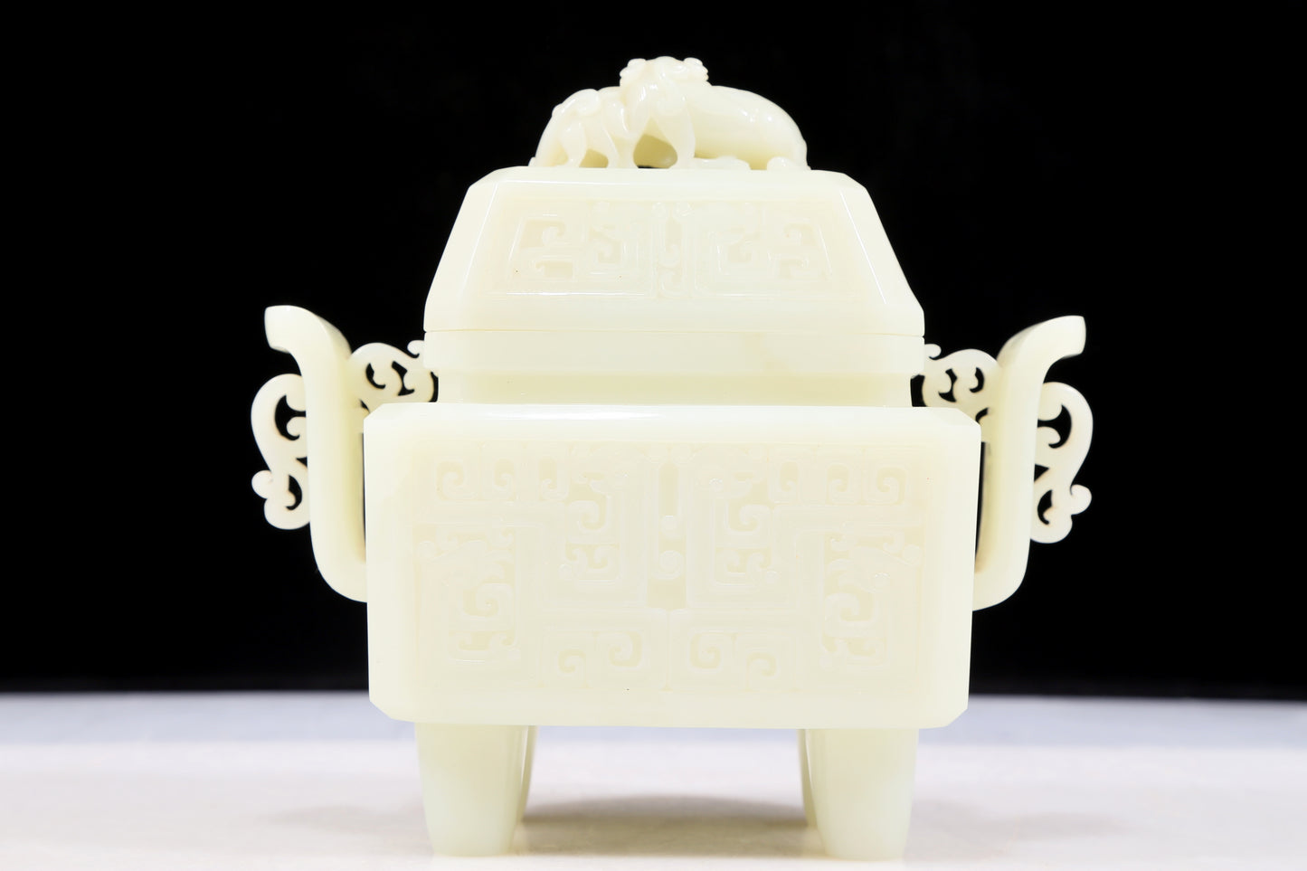 An exquisite white jade double-eared square stove with chilong pattern and lid