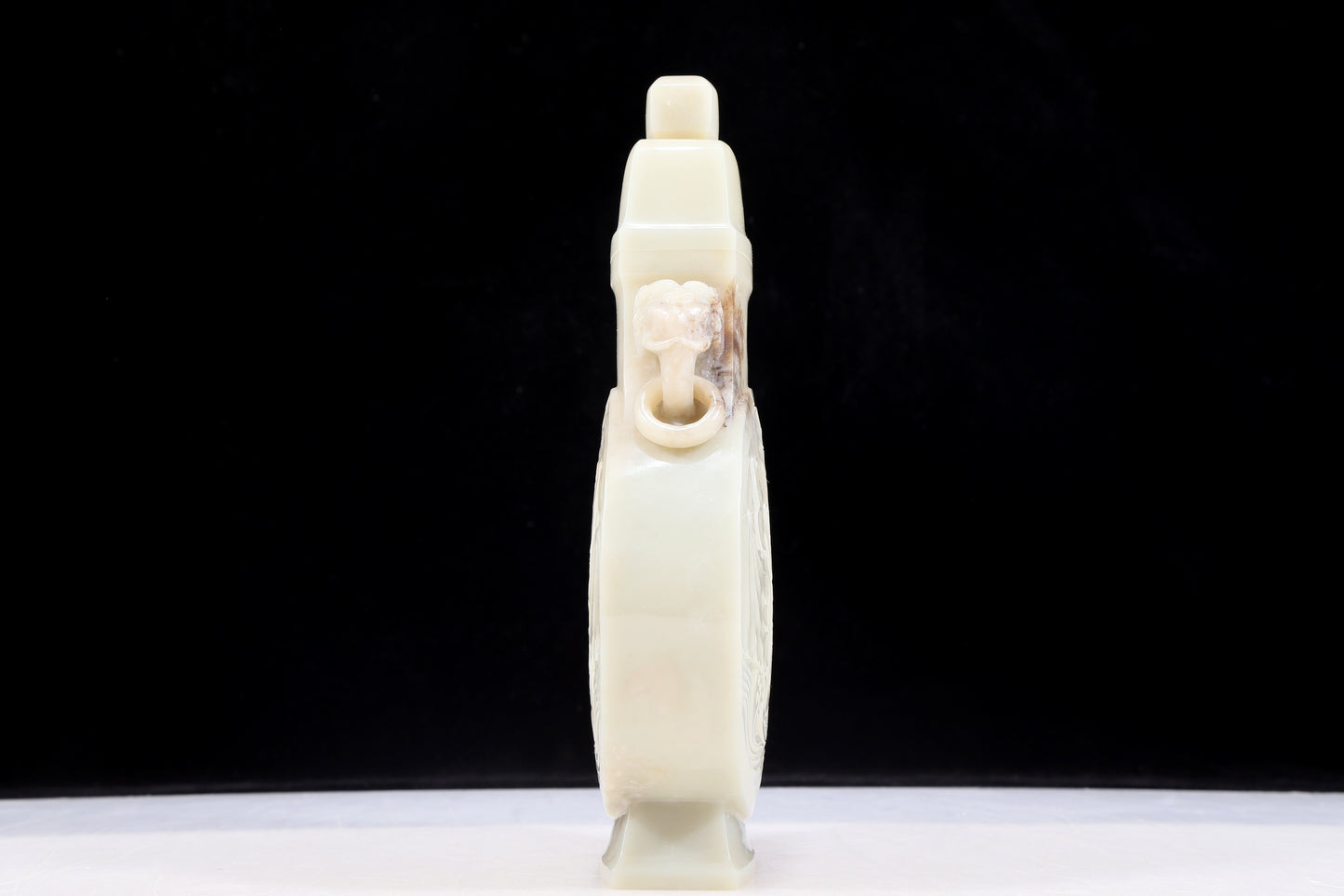 An exquisite white jade elephant ear vase with flower and bird patterns and lid