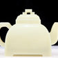 An exquisite white jade teapot