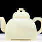 An exquisite white jade teapot