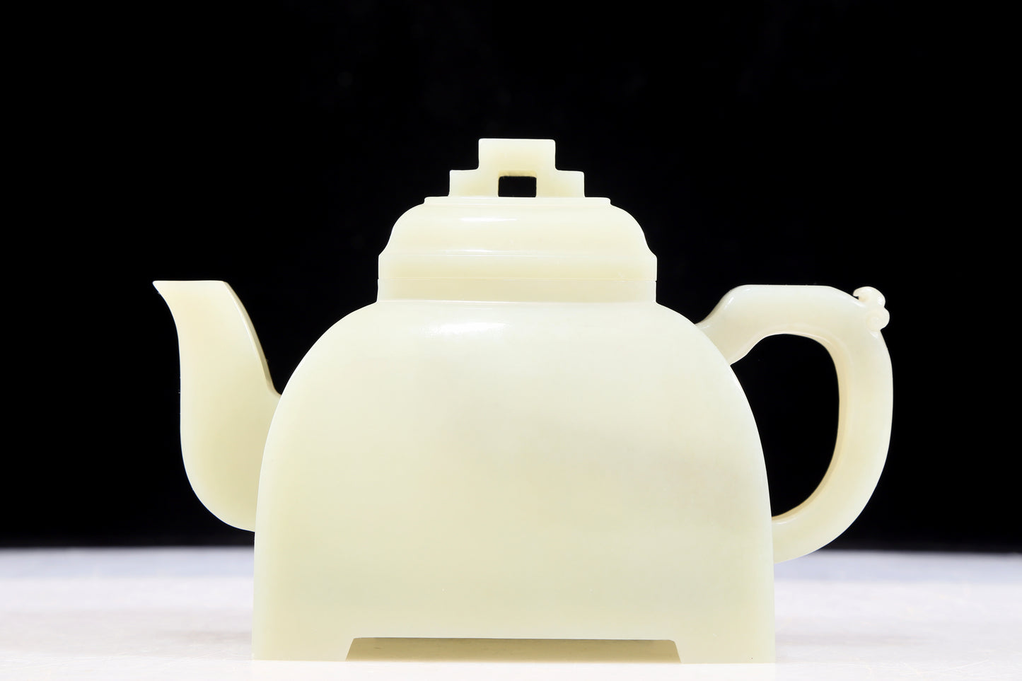 An exquisite white jade teapot