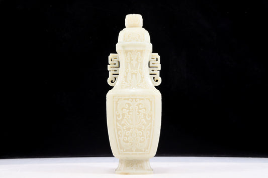 An exquisite white jade vases with double ears with lotus pattern and lid