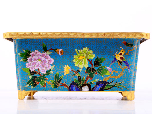 A delicate cloisonné flowerpot with butterfly and floral pattern