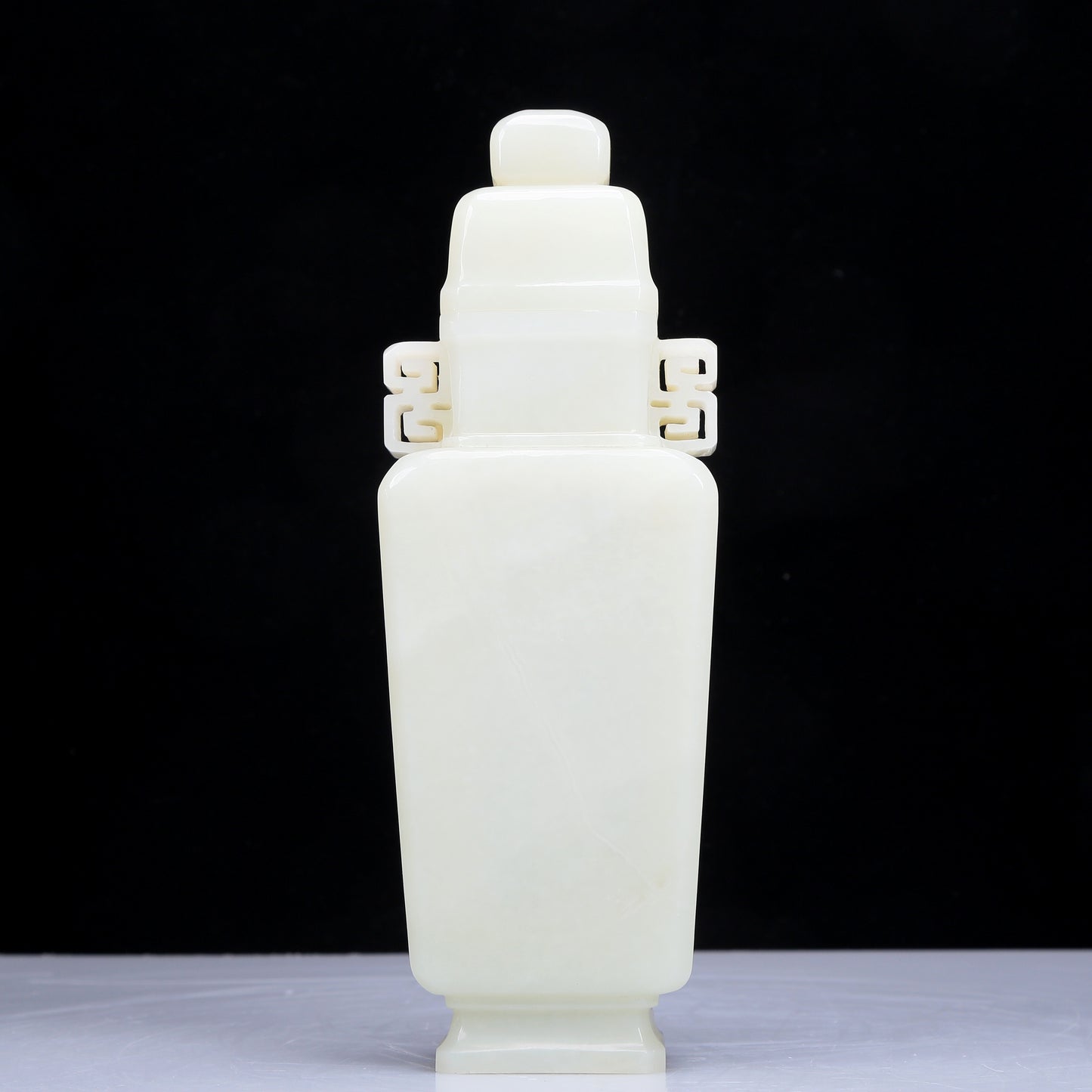 A Precious White Jade Vase And Cover