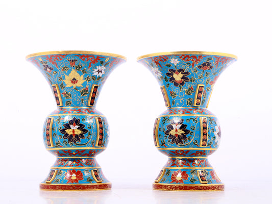 A pair of cloisonne lotus pattern bottles