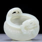 A Precious White Jade 'Dragon' Tripod Censer. Carved with archaistic motifs. Chinese Qing Dynasty. Size:11cmx7.5cm. Weight:400g     清代 白玉龙纹双耳三足炉