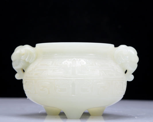 A Precious White Jade 'Animal Mask' Elephant-Handled Tripod Censer