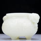 A Precious White Jade 'Animal Mask' Elephant-Handled Tripod Censer