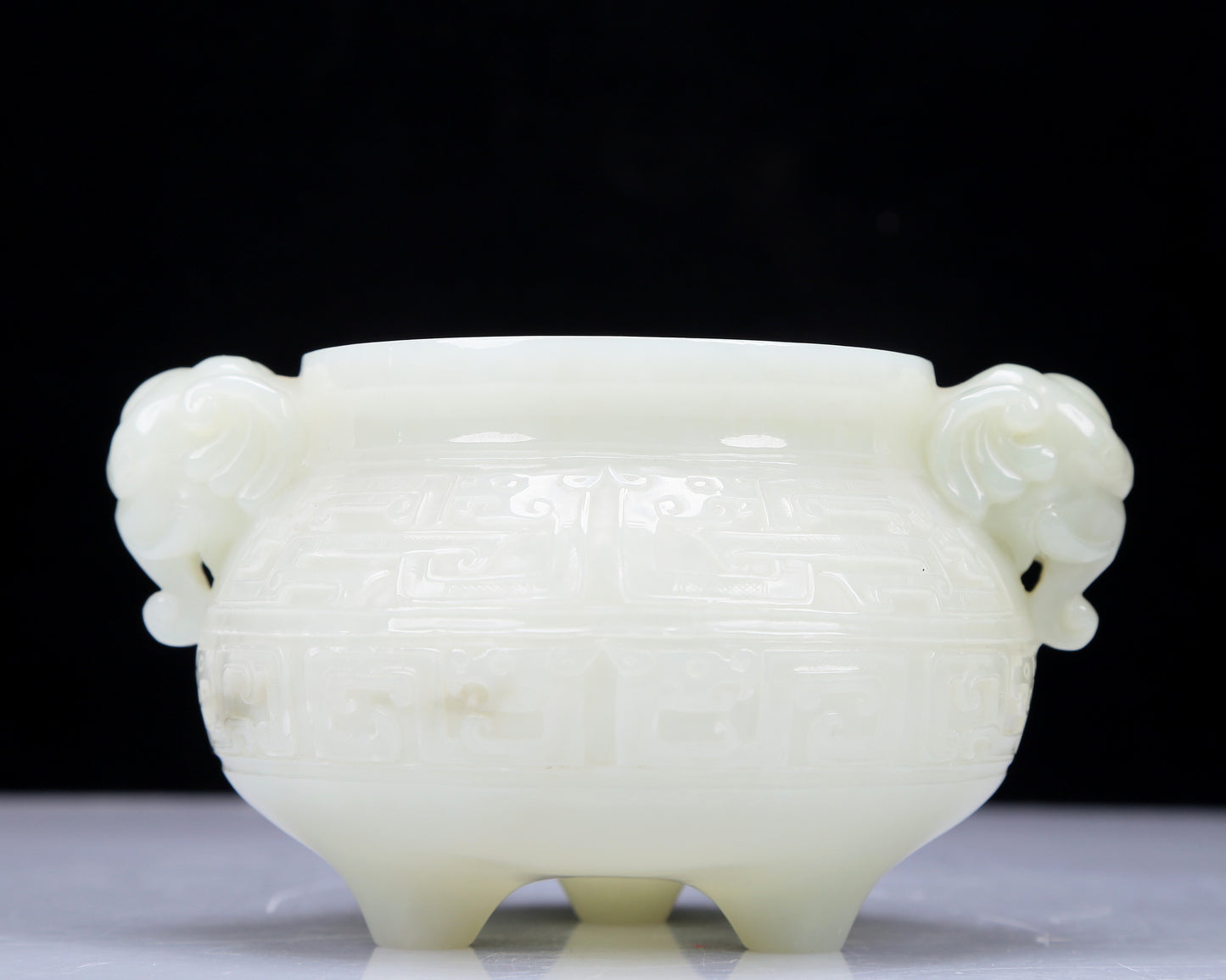 A Precious White Jade 'Animal Mask' Elephant-Handled Tripod Censer