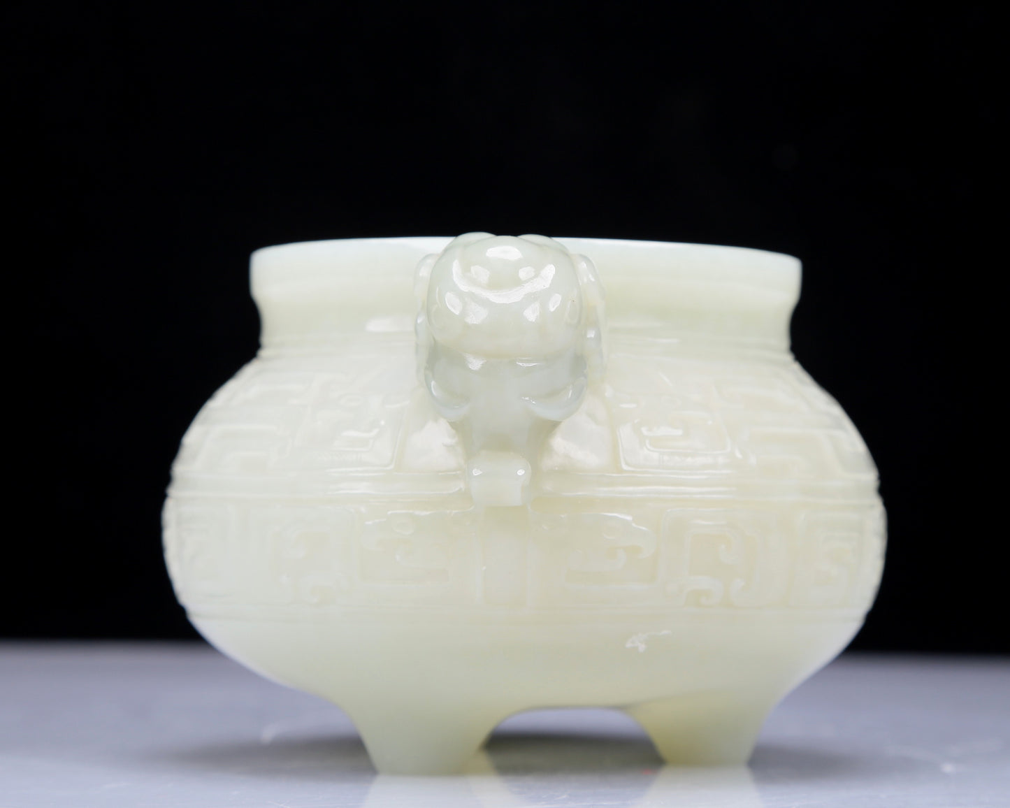 A Precious White Jade 'Animal Mask' Elephant-Handled Tripod Censer