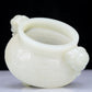 A Precious White Jade 'Animal Mask' Elephant-Handled Tripod Censer